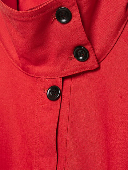 Red stand collar jacket fabric detail