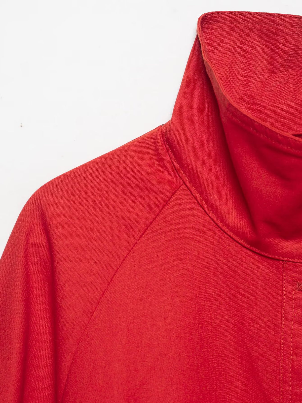 Red stand collar jacket side view