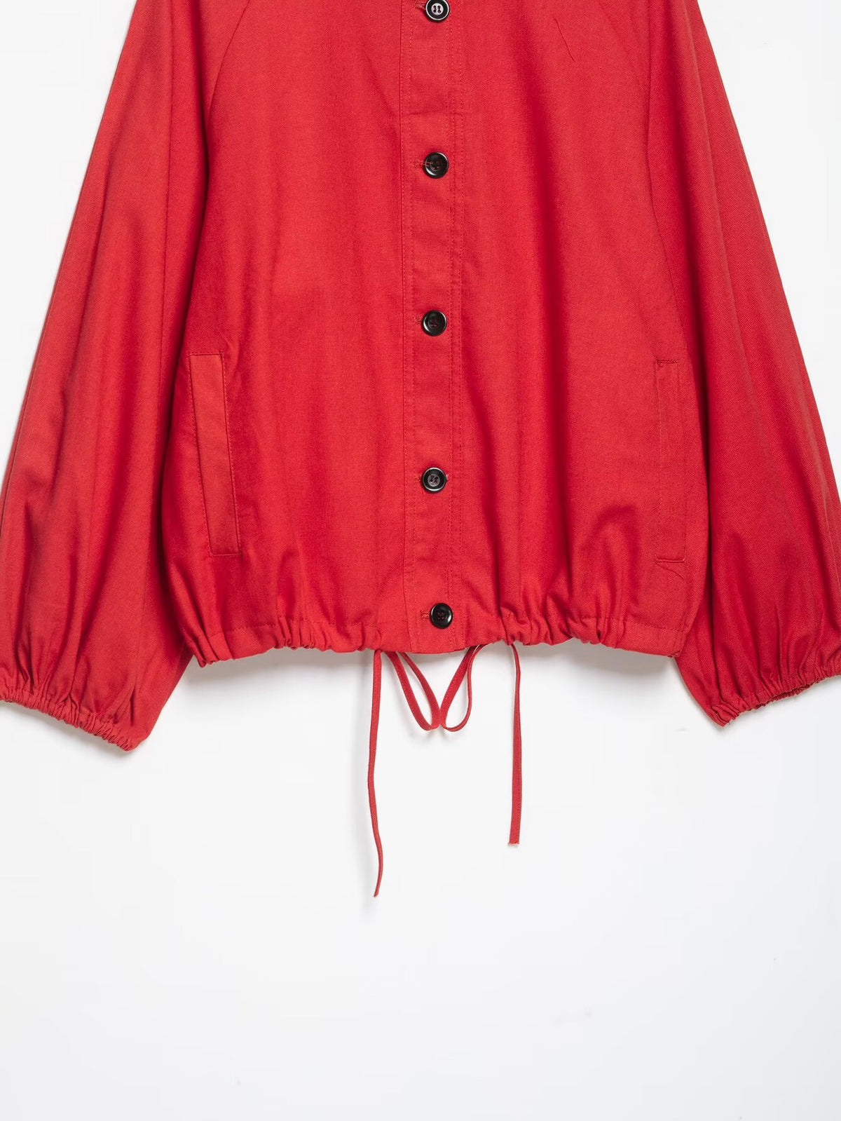 Red stand collar jacket closure detail